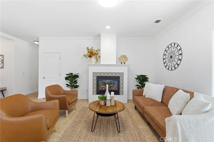 Gas fireplace insert in the open living area.
