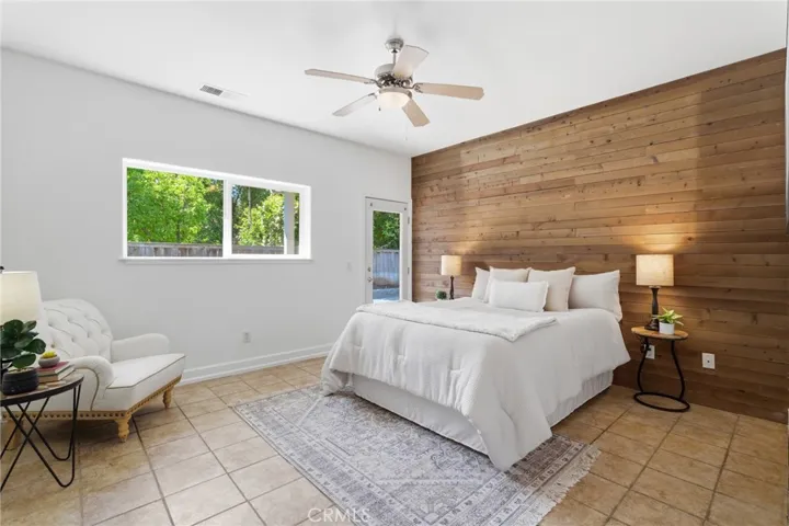 Primary Bedroom with wood slat accent wall