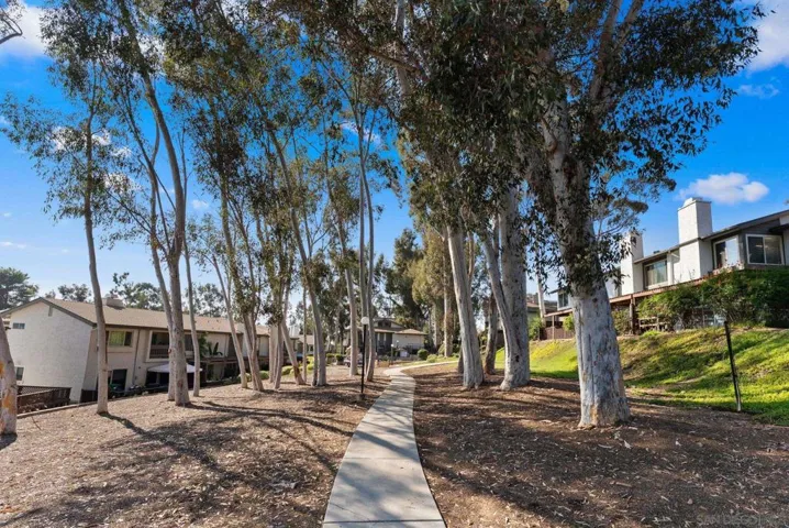Residents enjoy multiple tree-lined walking trails throughout the community.