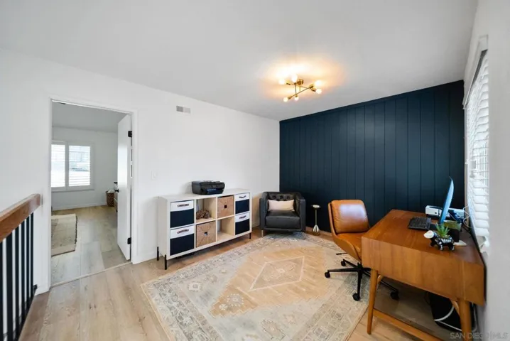 Upstairs loft can be closed off to create an optional 4th bedroom.