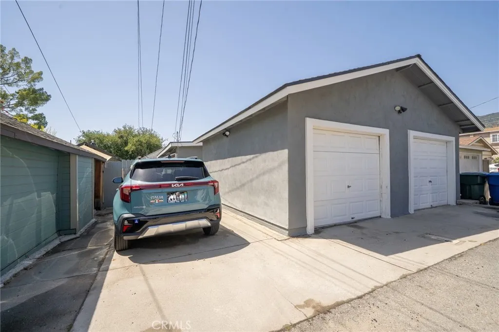 Two car detached Garage and one parking space