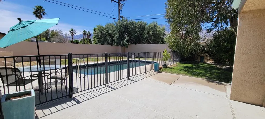Patio and Security fence around pool