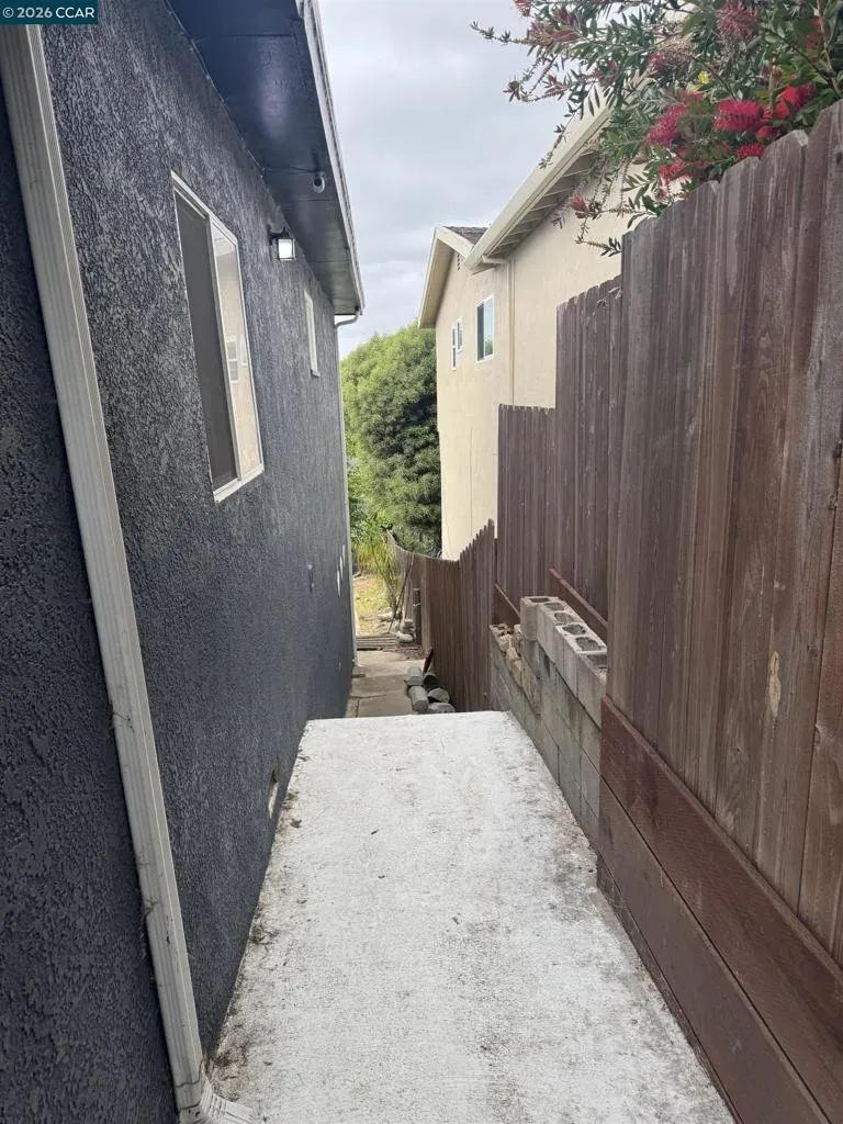 side house steps to backyard