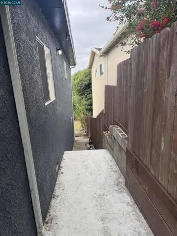 side house steps to backyard