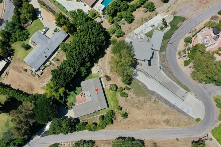 There is room for a pool or ADU on the dirt lot