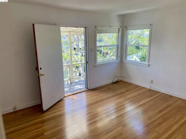 Unfurnished room with light wood-style floors