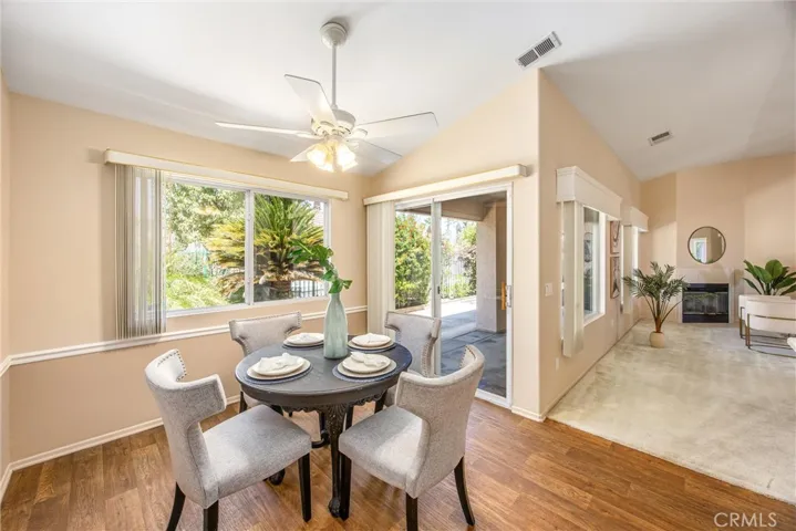 Informal Dining off of Kitchen. Beautiful view out the windows