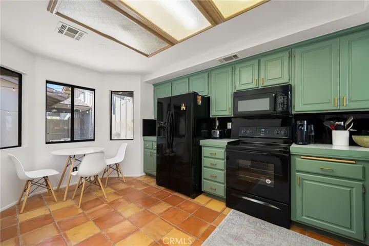 Kitchen with nook for dining or more storage could be added