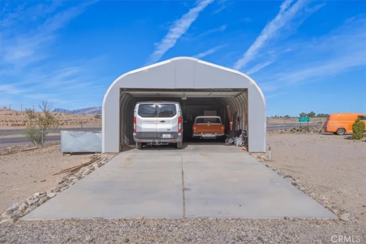 Ample garage parking with exterior parking on concrete