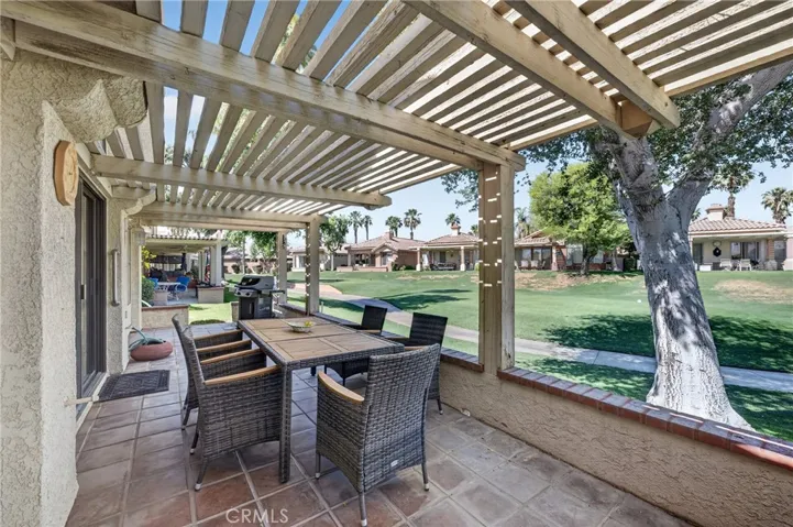 Covered patio with 18th tee views.