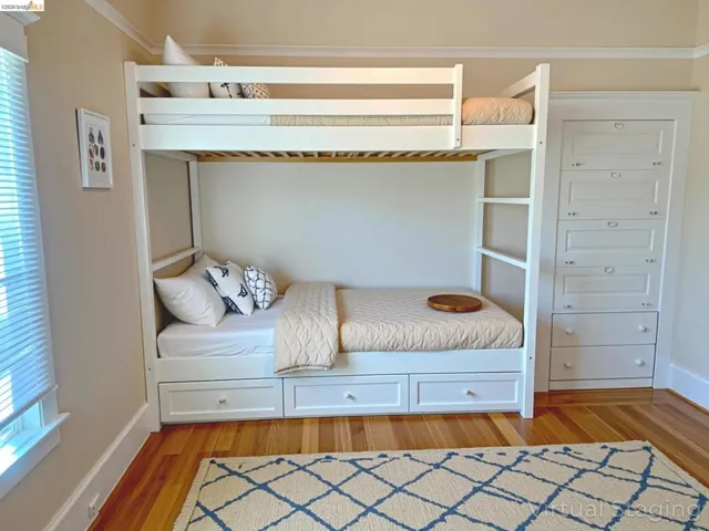Bedroom featuring light wood-style flooring