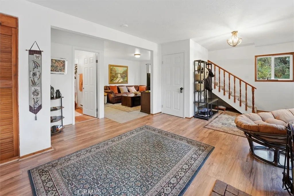 Living room. Stairs to upper level.