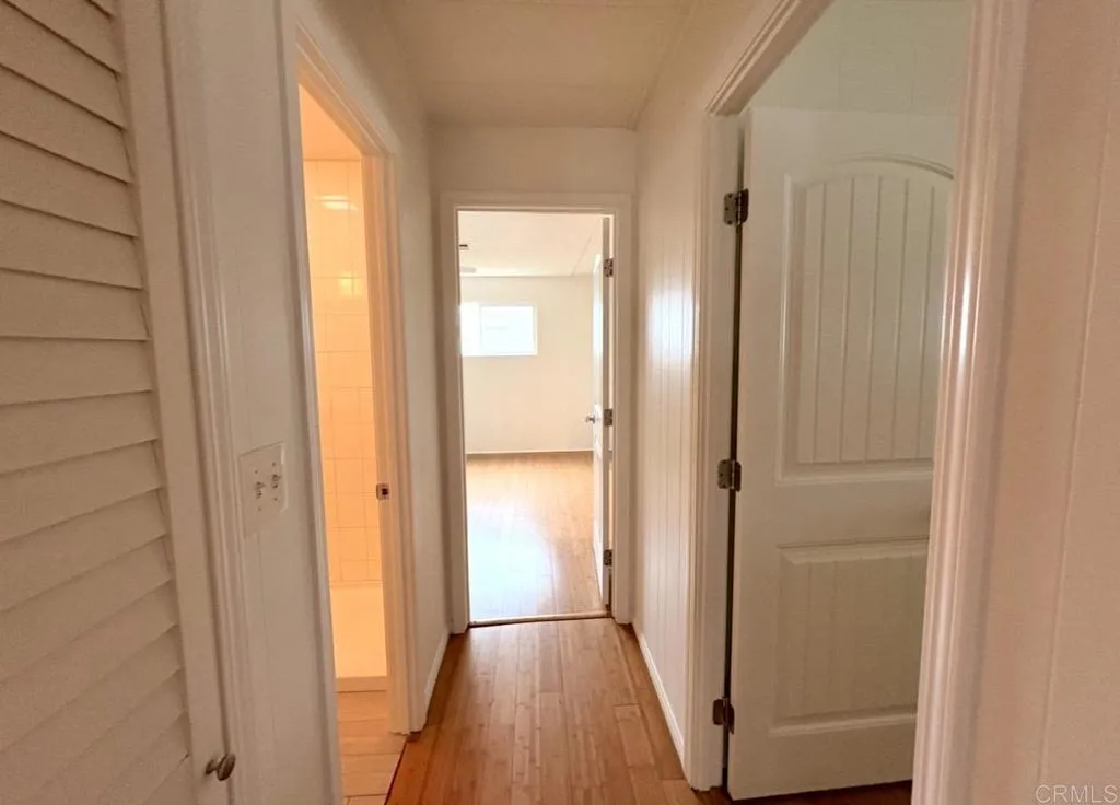 Center hall shows upgraded panel doors