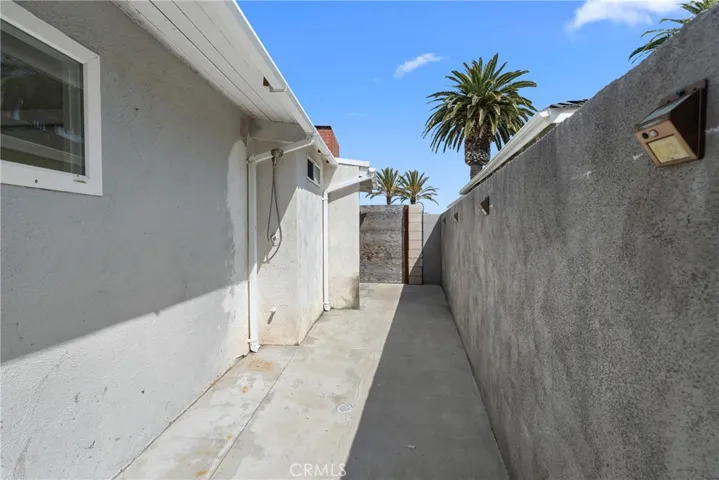 two outdoor showers and room for boards and bikes