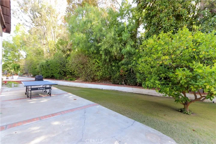 Spacious patio with room for outdoor games, dining, and entertaining