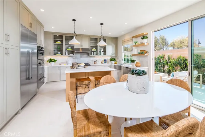 Kitchen and eat in area model home 
