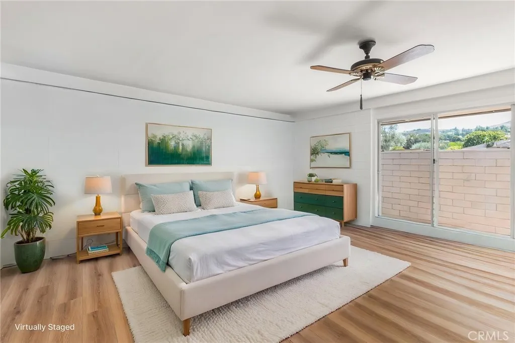 Virtually staged primary bedroom without cabinet