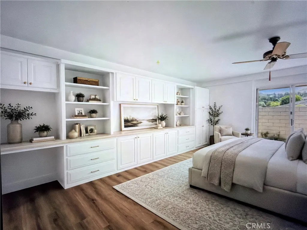 Virtually Staged Primary Bedroom with cabinet painted white