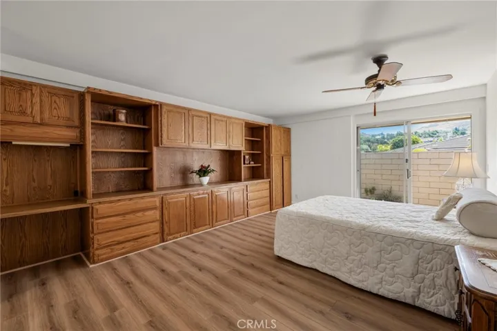 Primary Bedroom with Oak cabinet