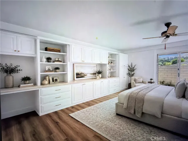 Virtually Staged Primary Bedroom with cabinet painted white