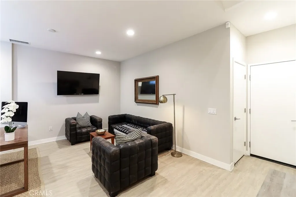 This is a possible fourth bedroom and is now used as a study/den! It is on the first floor and adjacent to the garage!