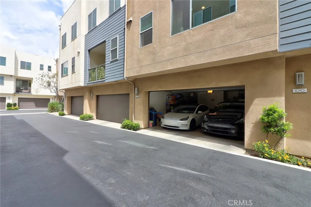 This property features a directly connected 2-car garage, offering exceptional convenience. The garage is equipped with a Tesla charger for electric vehicle owners and includes a water softener for improved water quality throughout the home.