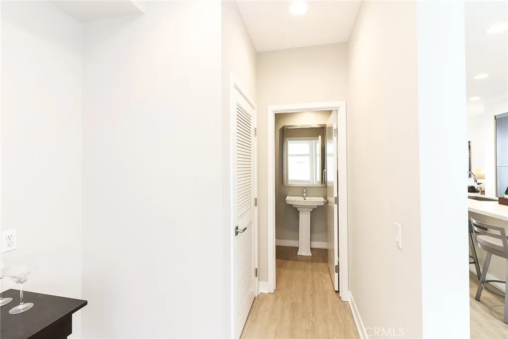 Hallway to half bath in the second floor.