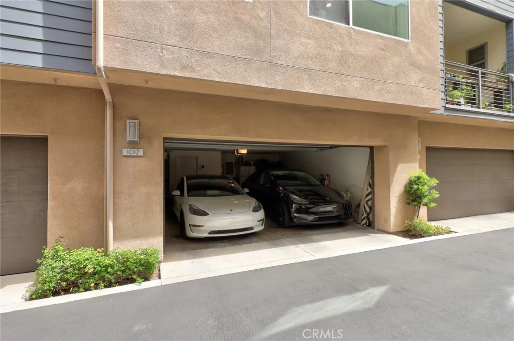 This property features a directly connected 2-car garage, offering exceptional convenience. The garage is equipped with a Tesla charger for electric vehicle owners and includes a water softener for improved water quality throughout the home.