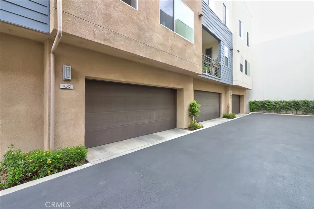 This property features a directly connected 2-car garage, offering exceptional convenience. The garage is equipped with a Tesla charger for electric vehicle owners and includes a water softener for improved water quality throughout the home.