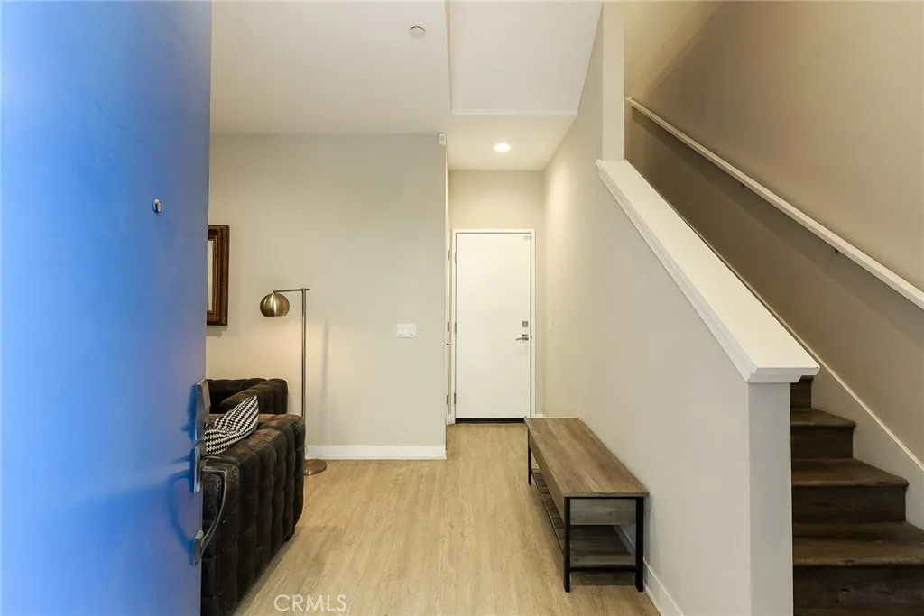 Hello home! Open the blue door to a place to welcome guests or convert to a 4th bedroom!