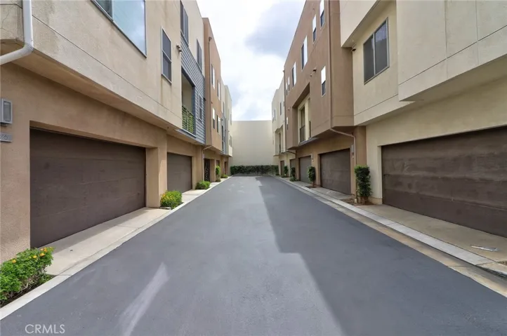 This property features a directly connected 2-car garage, offering exceptional convenience. The garage is equipped with a Tesla charger for electric vehicle owners and includes a water softener for improved water quality throughout the home.