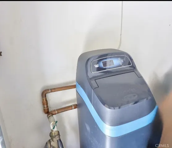 The water softener inside the attached 2 car garage.