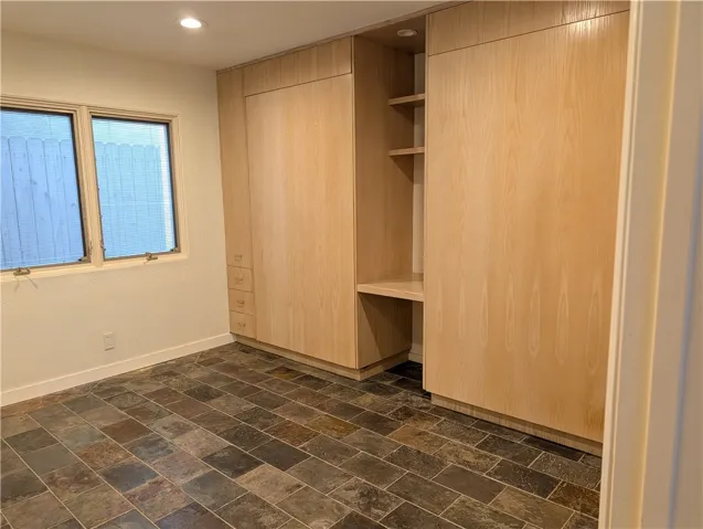 Bedroom with twin cabinet beds
