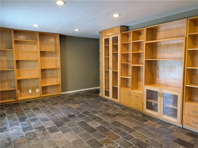 Lower level bedroom, large enough for a den