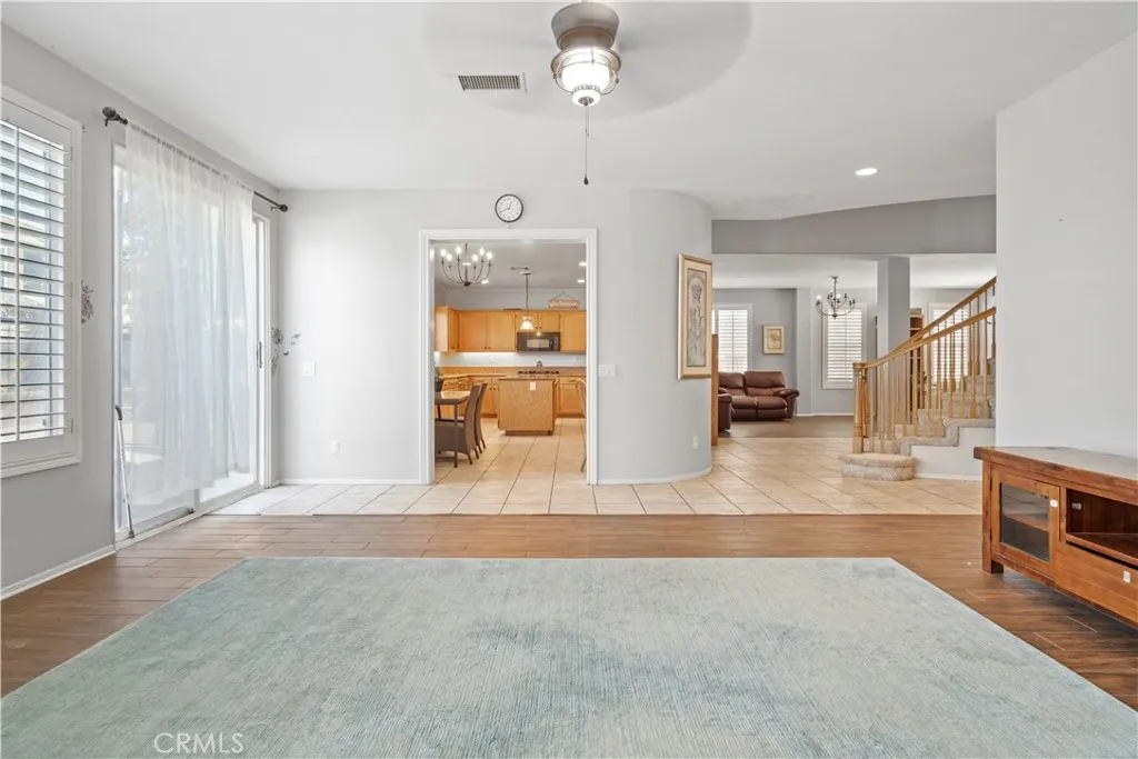 Other view from Family room of kitchen and dinning area and stair case