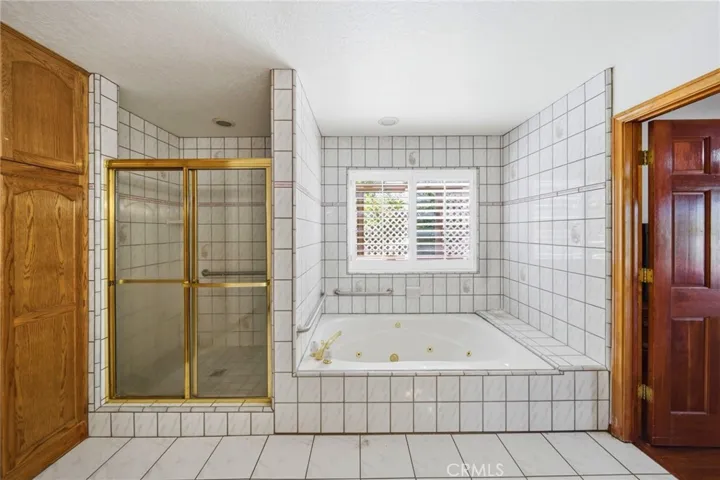 Primary with shower & Jetted tub