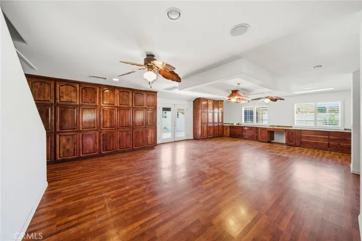 Tons Of Cabinetry and French Doors to the Infinity Backyard