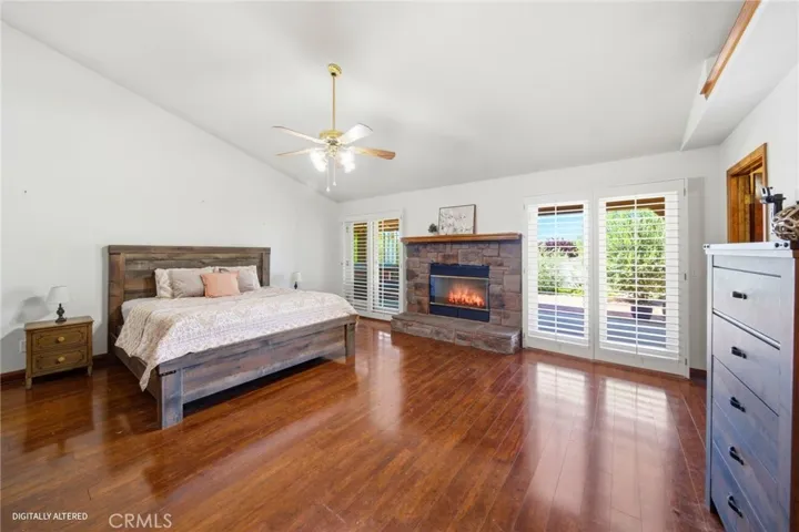 Primary with Fireplace & 2 French Doors