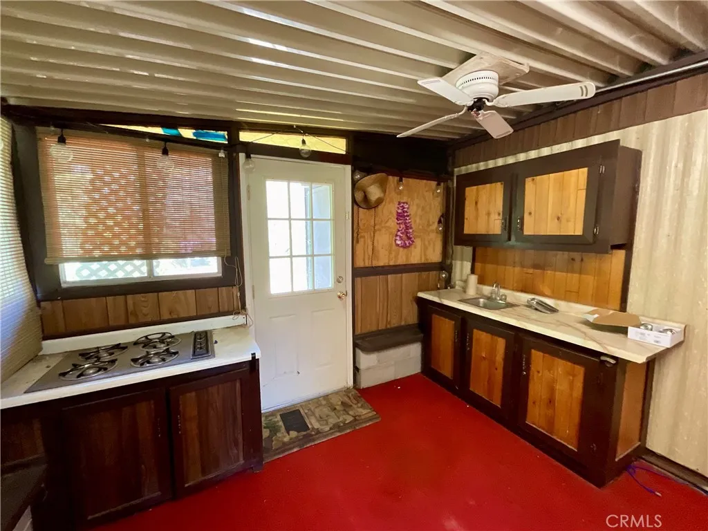 side room outdoor style kitchen patio room
