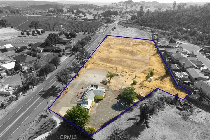 another aerial view of property showing highway