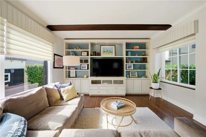 Spacious and comfortable family room overlooks the front and back yards.
