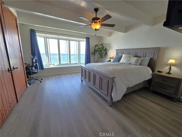 Primary bedroom w/ ocean views