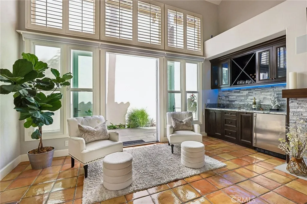 French Doors and Floor to Ceiling Windows.