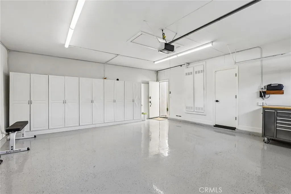 Wall to Wall Cabinets and 2 Storage Closets