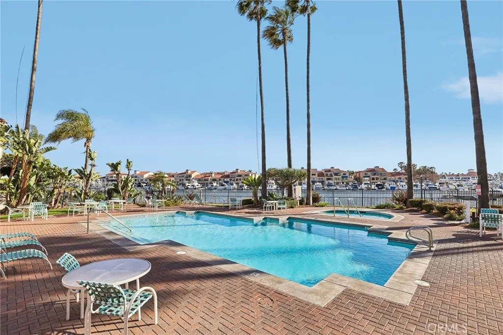 Resort style pool area sits right on the water.