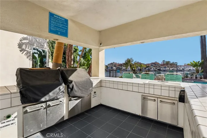2 BBQ's, Sink, Storage and Bar