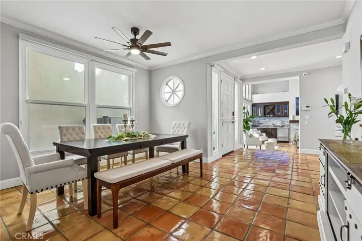 Spacious dining room separates the Entertainment Room from the Great Room.