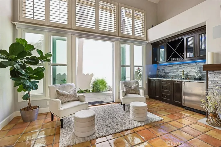 French Doors and Floor to Ceiling Windows.