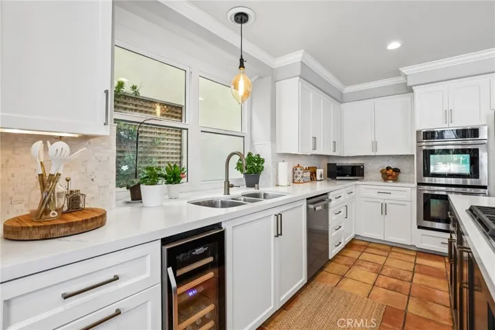 Appliances include a Dual Zone Wine and Refrigerator and Bosche Dishwasher