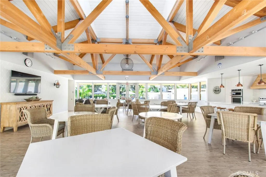 The newly remodeled clubhouse (2) includes beautiful, vaulted ceiling, natural light flooding in and plenty of seating space to sit and relax, conduct meetings or enjoy a meal with family and friends or simply relax, turn on the television to watch your favorite show. Also included are the bathrooms.